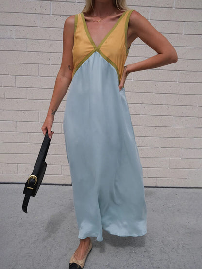 Vestido elegante con empalme de color en contraste con cuello en V