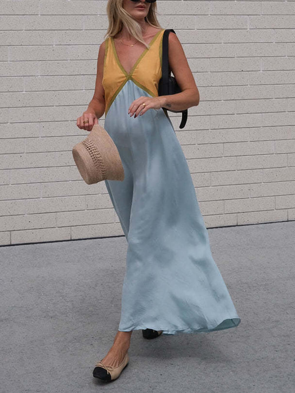 Vestido elegante con empalme de color en contraste con cuello en V