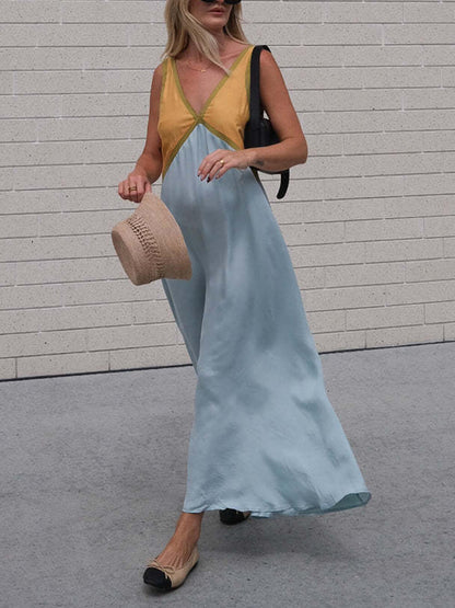 Vestido elegante con empalme de color en contraste con cuello en V