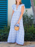 Vestido largo con cuello en V y mangas acampanadas con medallón azul
