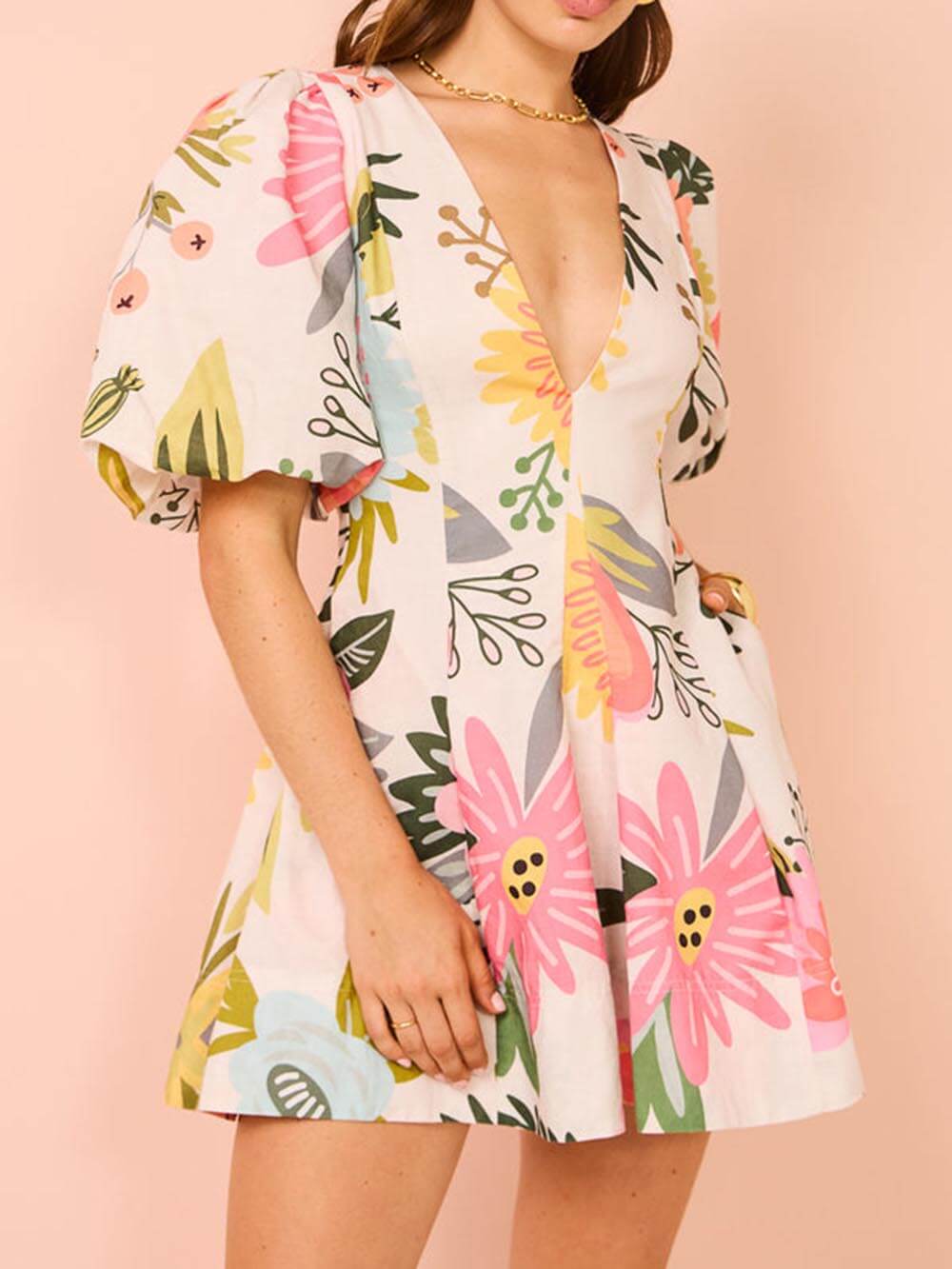 Minivestido con bolsillos y estampado floral con mangas abullonadas