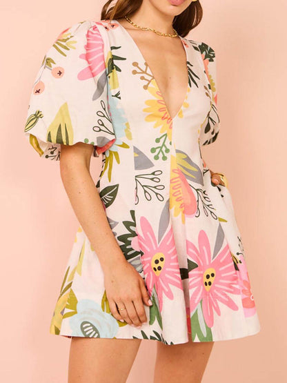 Minivestido con bolsillos y estampado floral con mangas abullonadas