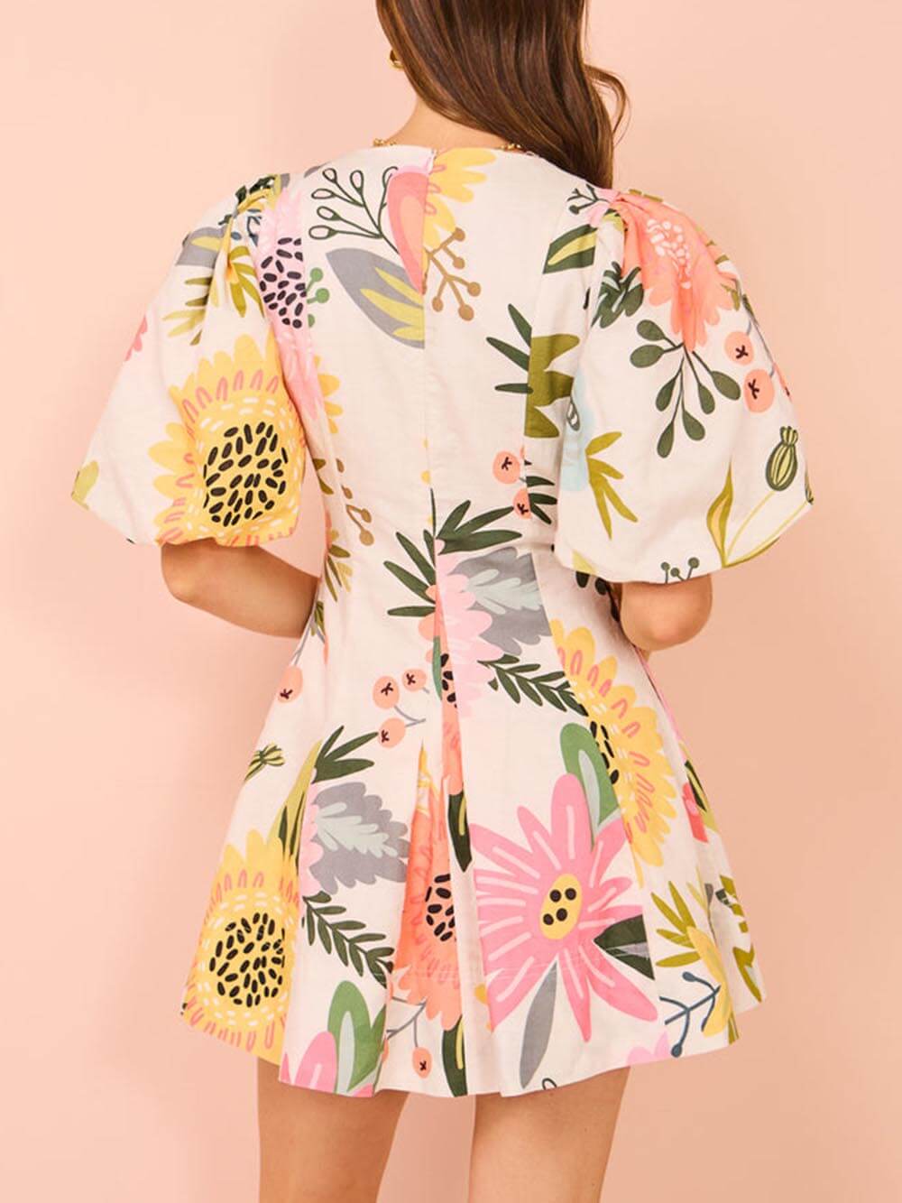 Minivestido con bolsillos y estampado floral con mangas abullonadas