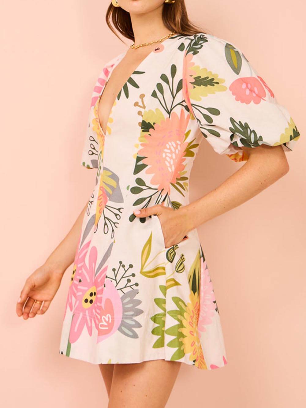 Minivestido con bolsillos y estampado floral con mangas abullonadas