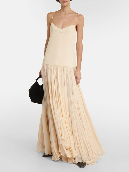 Vestido irregular con cintura caída y tiras