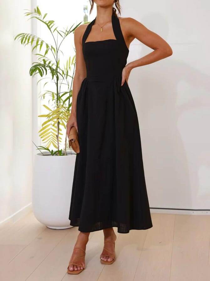 Vestido negro con cuello halter y cintura Vestido de longitud media
