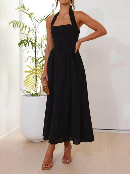 Vestido negro con cuello halter y cintura Vestido de longitud media