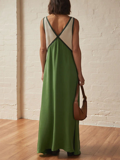Vestido elegante con empalme de color en contraste con cuello en V