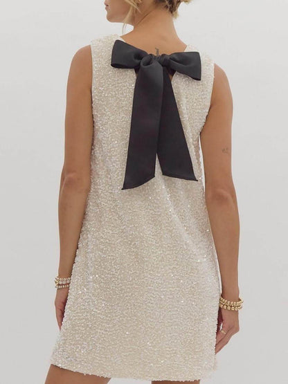 Minivestido de fiesta con lazo y lentejuelas